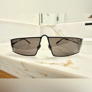 Saint Laurent unisex Black cutout sides, no scratches new in case.